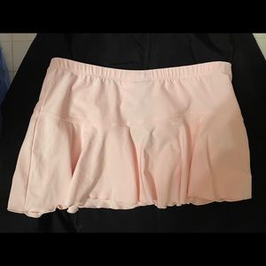Woman’s pink Nike Tennis skirt